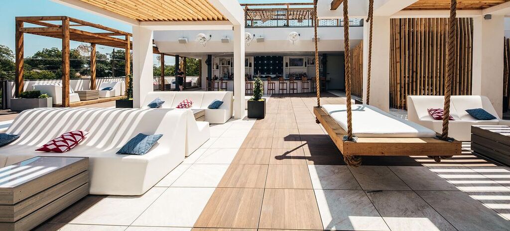 77-Degrees Rooftop-Bar 05, 77 Degrees Rooftop Bar | Dallas, TX featuring products from Tile Tech Pavers | 77-Degrees