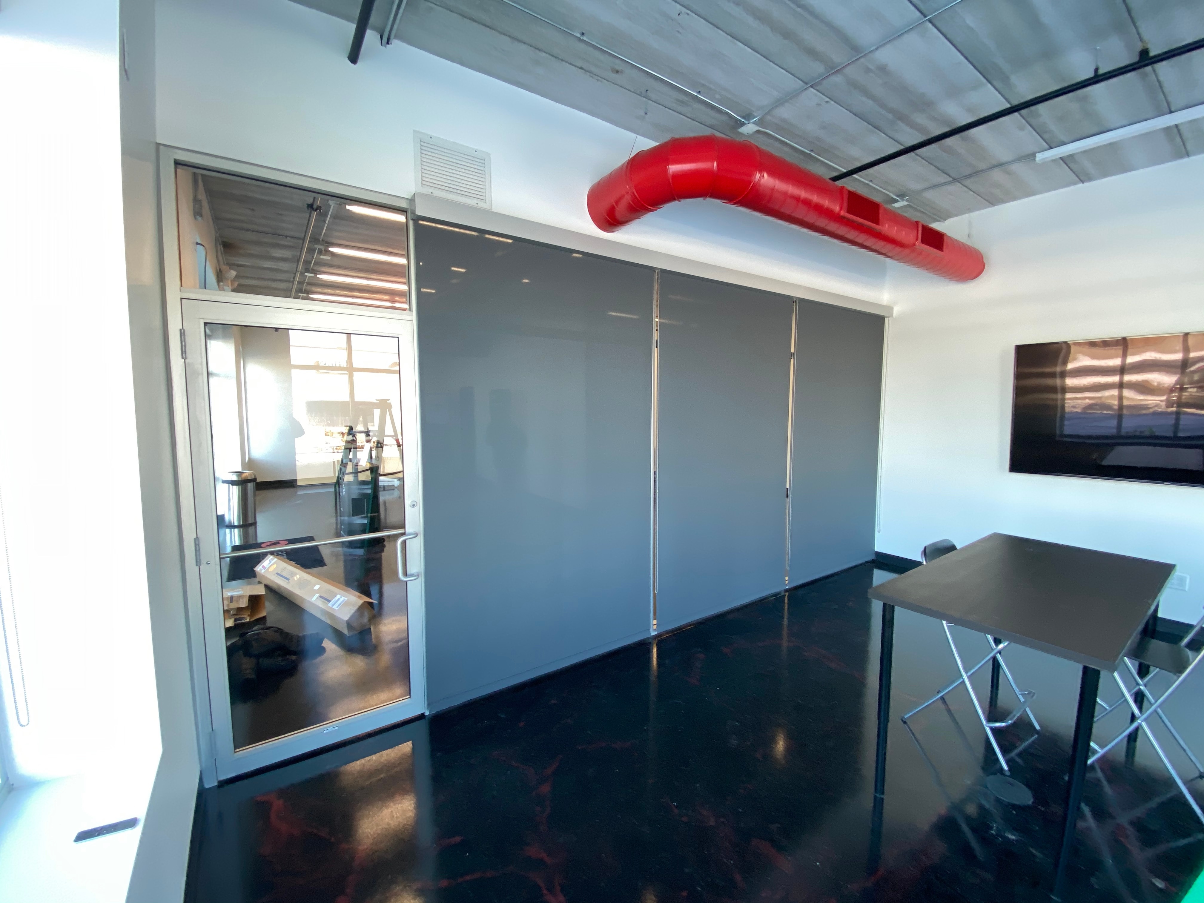 american drapery systems rolling shades conference room American