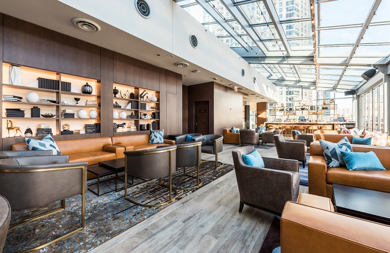 Antunovich Associates Gibsons Italia Chicago Illinois Common Area Bar, A naturally lit space where guests can relax and have