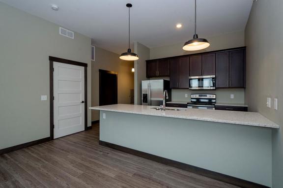 The Depot Apartments // Standard Dome, brand, The Depot Apartments uses Standard Dome by Bock Lighting.