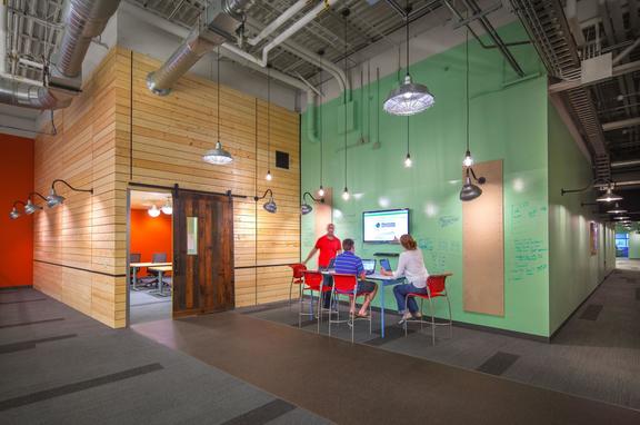 The Paradigm Offices, brand, The Paradigm offices use the Step Neck Dome, Emblem Sign Brilliante, and Shallow Dome lighting