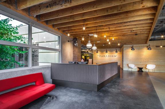 The Paradigm Offices, brand, The Paradigm offices use the Step Neck Dome, Emblem Sign Brilliante, and Shallow Dome lighting