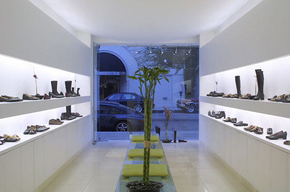 Taryn Rose, professional, A ceiling free of downlights and indirect illumination set this establishment apart from other