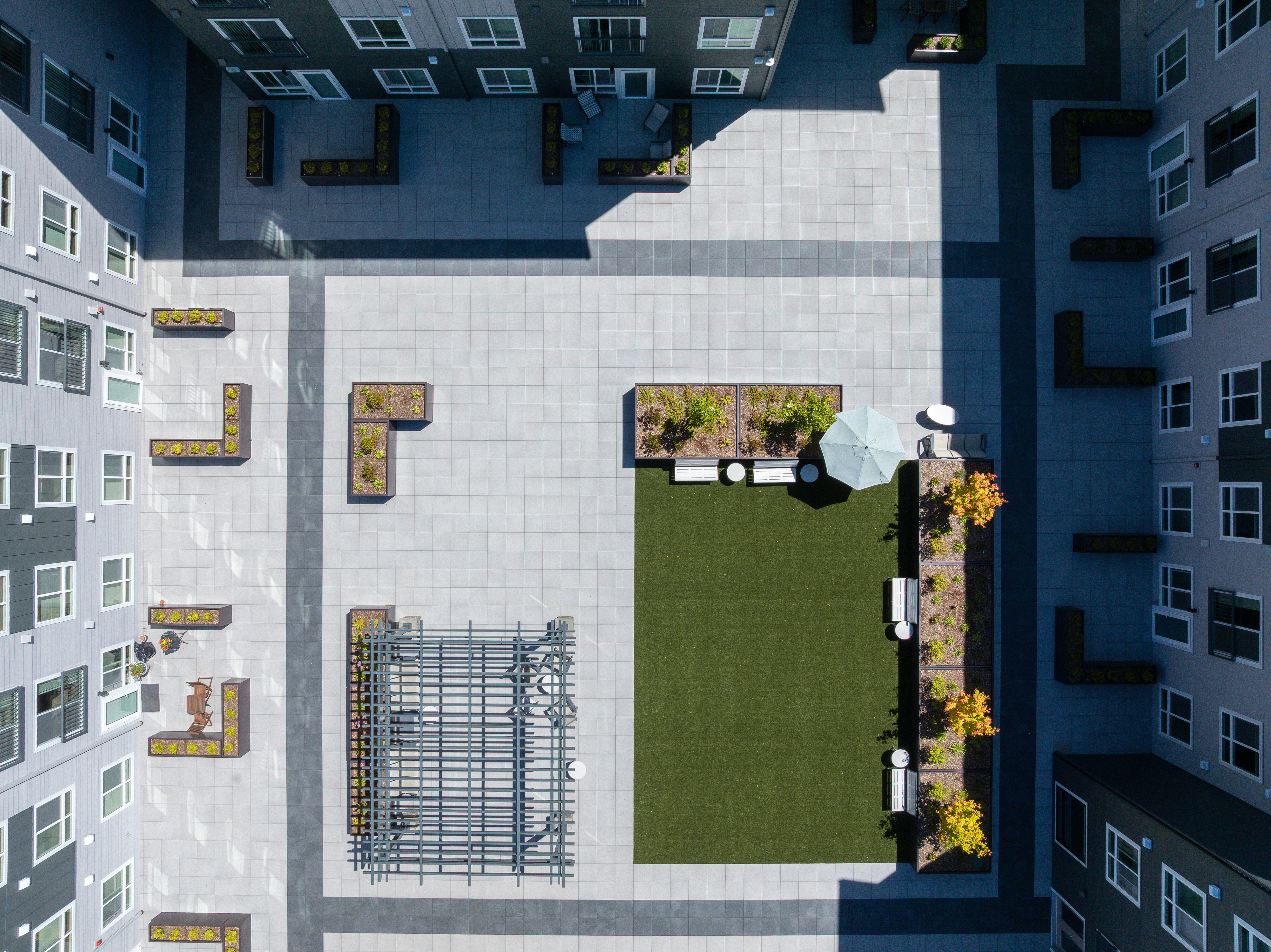 Ovation at Painfield, brand, Johnson Braund, Inc. worked with Archatrak to redesign the courtyard roof deck for the