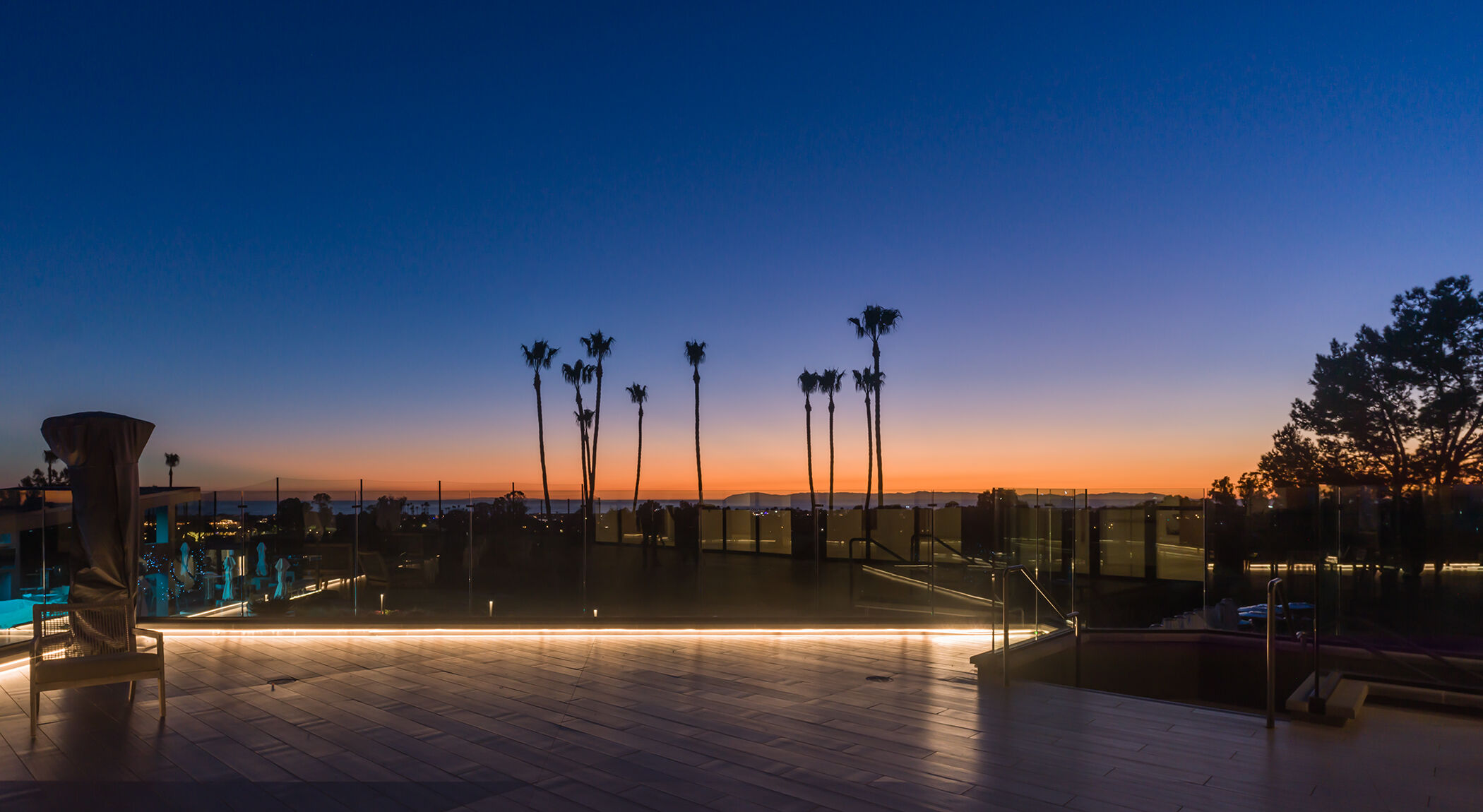 DURAFLEX ARCH TOP FLEX, The property features a stunning 85-foot long pool surrounded by lounge seating and cabanas, LED