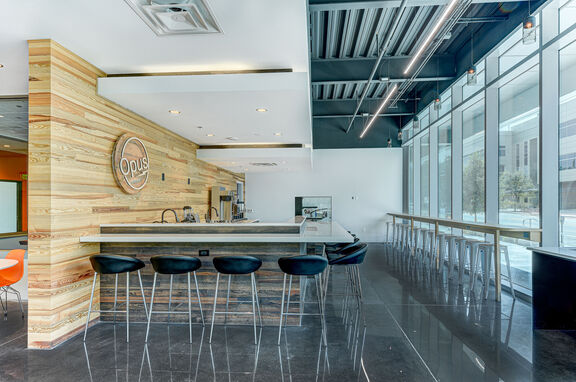 Opus Coffee House, brand, Goodwin provided Antique Longleaf Heart Pine for the gorgeous feature wall and bar front of Opus