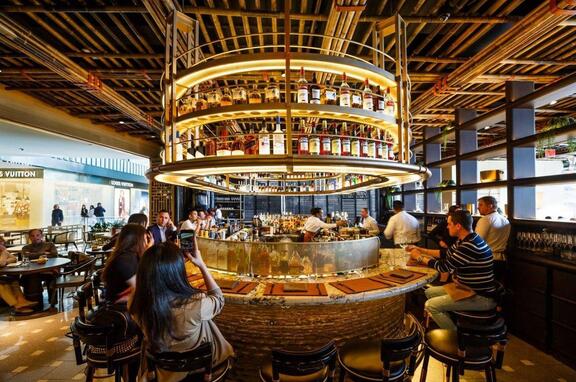 Hudson Yards Bar, brand, Custom brass bar furniture: bar stand and shelves. Custom brass canopy