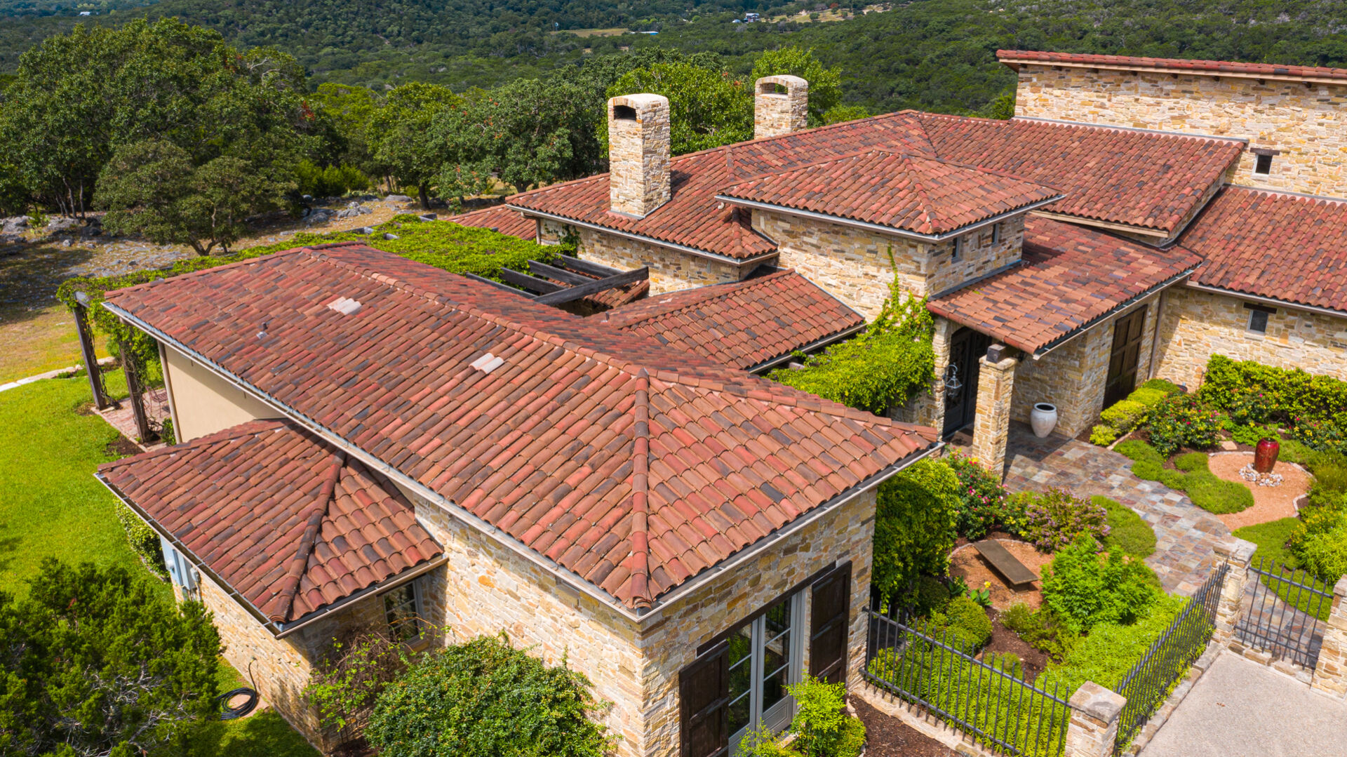 Residential-handmade-clay-tile-roof-two-story-by-schulte-roofing-texas-1920x1079