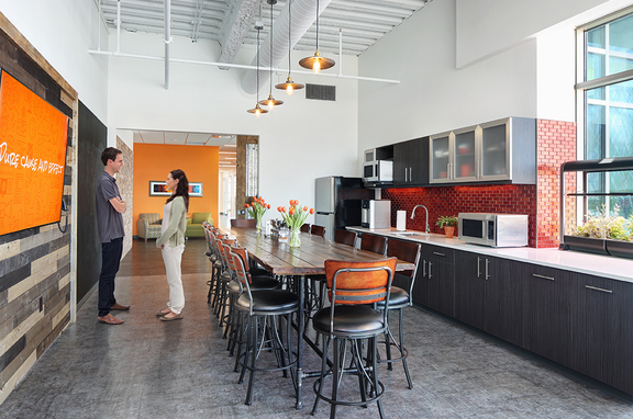 Rippe Keane, professional, Open workplace environment branded with client colors.
