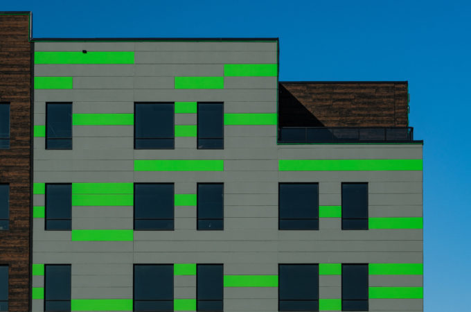 Vibrant Color Finish healthcare exterior design concrete color treatment, Nawkaw’s expert color treatment transformed this